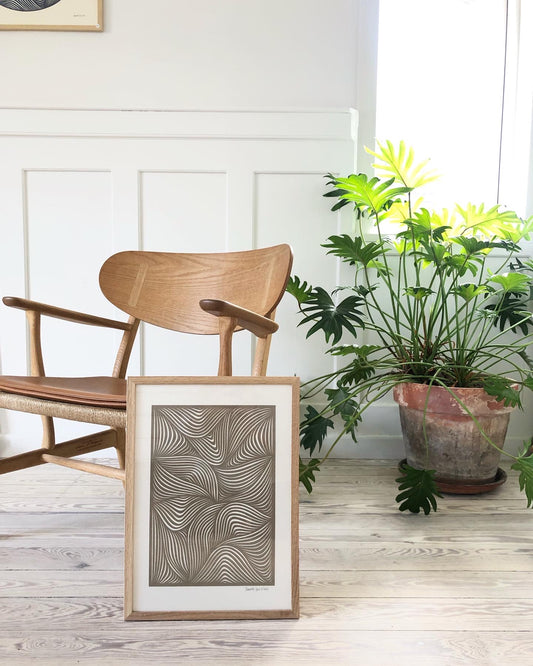 Khakigrønt klip på knækket hvid baggrund, A3